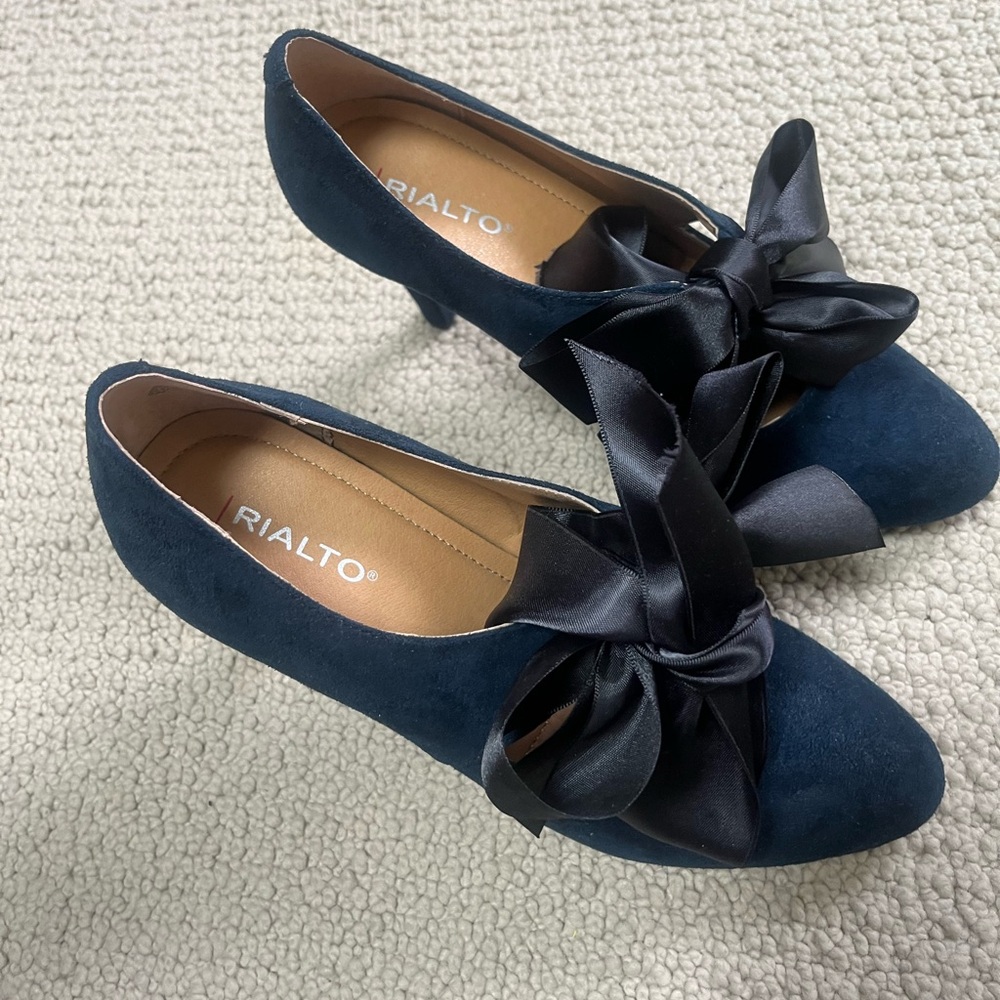 Rialto navy heels, never worn.
